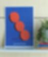 A poster of 3 round shapes